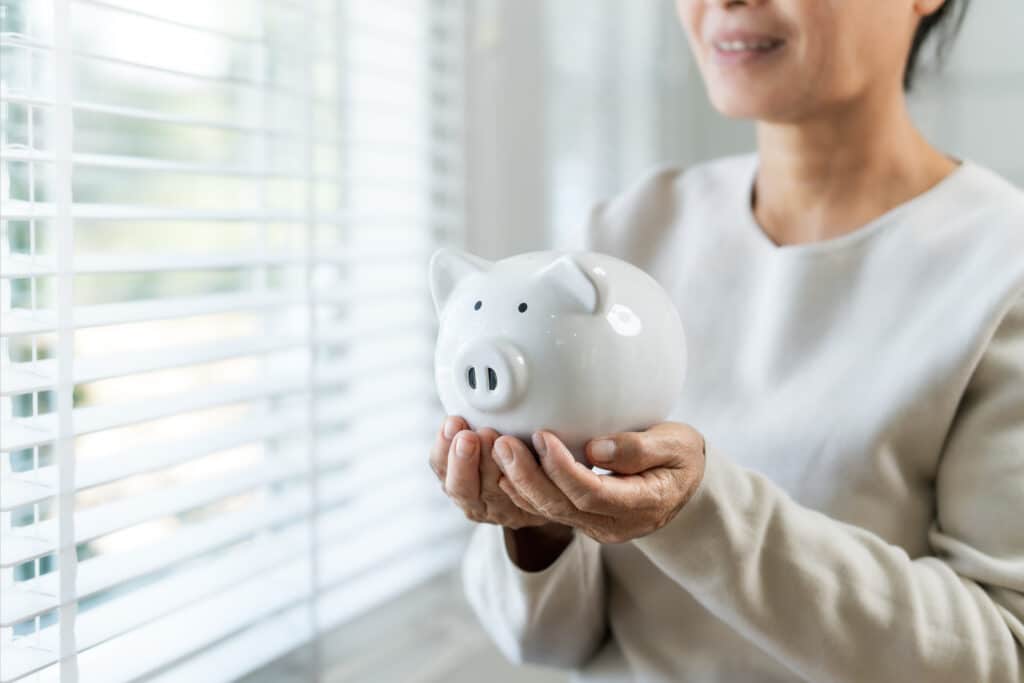 woman holding piggy bank