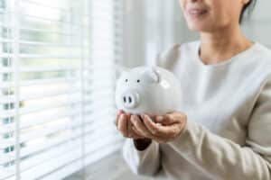 woman holding piggy bank